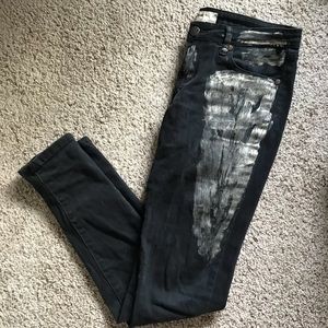 Gold paint smeared skinny jeans
